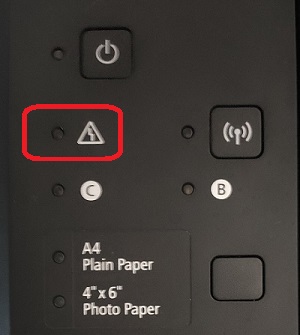 voyant d'alarme triangle éclair clignote orange sur imprimante Canon, que faire?